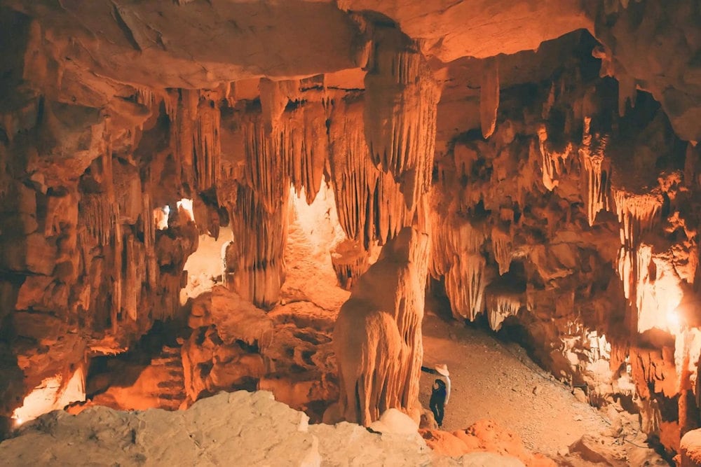 Every corner of the cave reveals a breathtaking interplay of light and shadow, painting an otherworldly scene